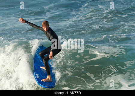 Surfing At Hermosa Beach, Los Angeles, California. Stock Photo