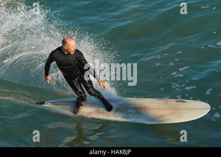 Surfing At Hermosa Beach, Los Angeles, California. Stock Photo