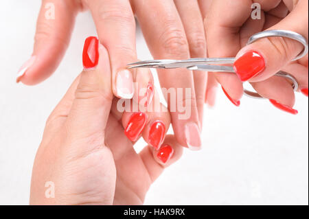 Cuticles care with cuticle pusher Stock Photo