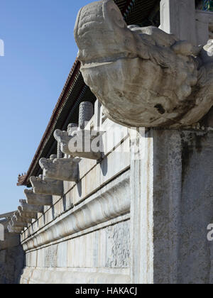 White marble gargoyle in the Forbidden City, Beijing,China against clear blue sky Stock Photo