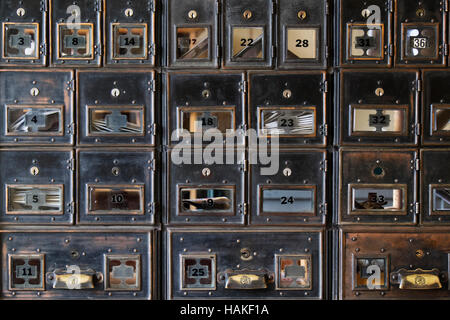 Wall of old post office boxes in Barkerville Historic Town in British Columbia, Canada Stock Photo