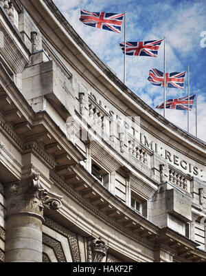 Top of the Admiralty Arch building with British Flags, London, England Stock Photo