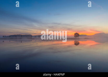 Landscape Reflecting in Lake at Dawn, Drei Gleichen, Ilm District, Thuringia, Germany Stock Photo