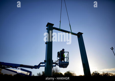 Work starting​ on Lancaster in Lancashire Uk home to Europe’s first Flight Tower Engineer woking on metal framed structure begins on Gravity instulation Stock Photo