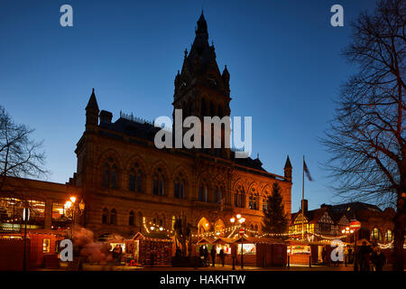 Chester German Christmas markets   Town hall exterior Christmas xmas festive seasonal market stalls gift  Market bazaar vendor trader traders independ Stock Photo