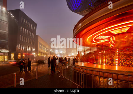 Salford Quays Manchester Lowry outlet mall  Shop shopping centre market outside event People crowds many crowded event markets show carousel night eyi Stock Photo