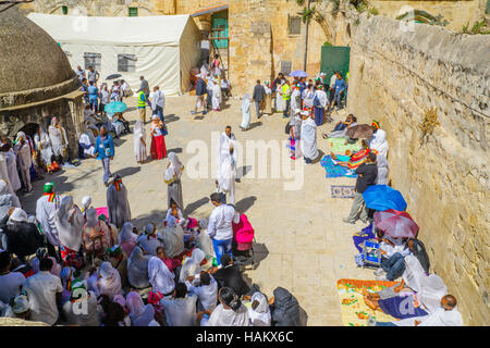 JERUSALEM, ISRAEL - APRIL 29, 2016: A crowd of Ethiopian Pilgrims gather in the Deir Es-Sultan, part of the church of the Holy Sepulcher, in Orthodox  Stock Photo