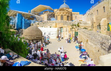 JERUSALEM, ISRAEL - APRIL 29, 2016: A crowd of Ethiopian Pilgrims gather in the Deir Es-Sultan, part of the church of the Holy Sepulcher, in Orthodox  Stock Photo