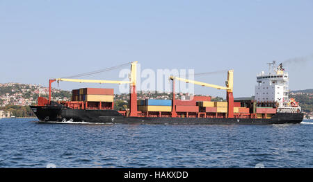 A container ship carrying goods between ports Stock Photo