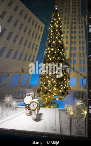 Christmas tree and wrist watches in Tiffany & Co. window display on Fifth Avenue in New York City Stock Photo