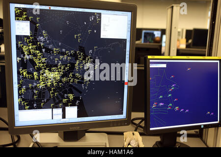 A radar screen (left) showing all the aircraft flying over England and Wales at NATS in Swanwick, which is home to the London Area Control Centre (LACC) and London Terminal Control Centre, as airline passengers could suffer delays of up to 20 minutes on every flight unless airspace is modernised, the head of the UK's National Air Traffic Control Service (Nats) Martin Rolfe has warned. Stock Photo