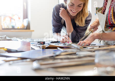 Stained glass artists working in studio Stock Photo