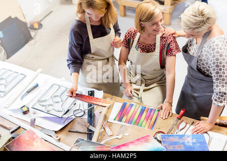 Stained glass artists working in studio Stock Photo