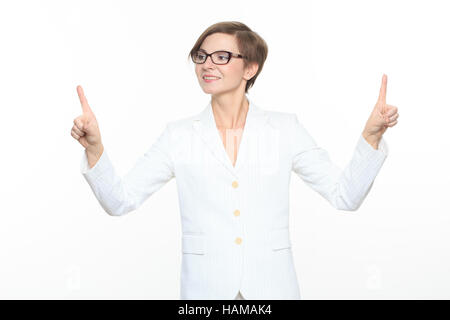 Young attractive businesswoman pressing the touchscreen button. Stock Photo
