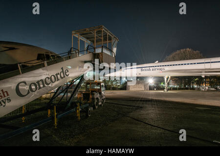 Retired Supersonic Airliner Concorde G-BBDG at night at the Brooklands Museum near Weybridge Stock Photo