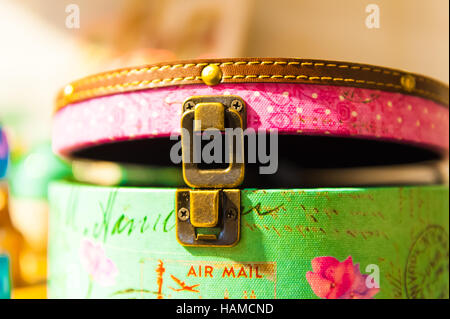 Bag retro bright colored leather trim iron lock open Stock Photo