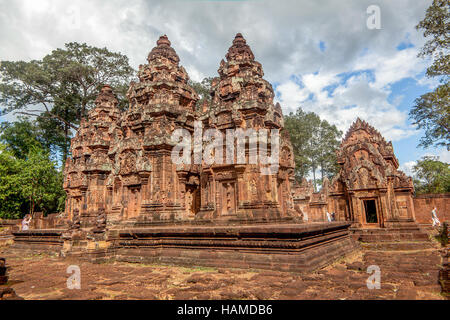 The inner sanctuary and towers of Banteay Srei, a 10th-century red sandstone temple dedicated to Shiva in Cambodia. Stock Photo