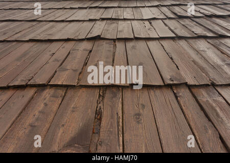 Natural pine wood panels from a wooden roof of a mountain stable Stock Photo