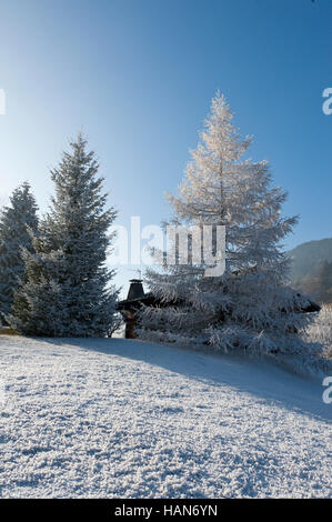 Megeve, Haute Savoie, France. 3rd December, 2016. 'Feels like' temperatures are around minus 4 degrees to 8 degrees centigrade as freezing fog hits the ski resort of Megeve on the day that people flock to the town for the Illumination du Sapin festival this evening. Credit:  Graham M. Lawrence/Alamy Live News. Stock Photo