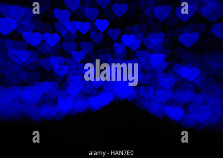 abstract black background with soft blue hearts Stock Photo