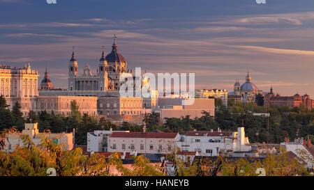 Madrid. Panoramic image of Madrid skyline with Santa Maria la Real de La Almudena Cathedral and the Royal Palace during sunset. Stock Photo