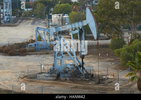 An Oil Pumpjack, Donkey, On Signal Hill, Long Beach, California. Stock Photo
