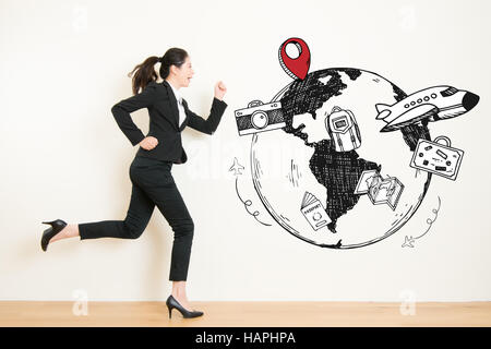 business woman daydreaming run to travel getaway from office work, beautiful mixed race asian chinese with travel concept Stock Photo