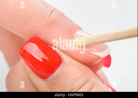 Cuticles care with cuticle pusher Stock Photo