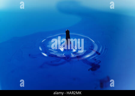 blue ink drops in water Stock Photo
