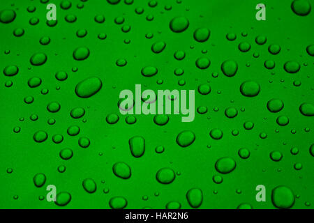 rain drops on green car paint threated with hydrophobic coating Stock Photo