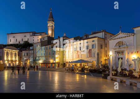 Twilight over St. George's Parish Church and town center (Tartinijev trg), Piran, Primorska, Slovenia Stock Photo