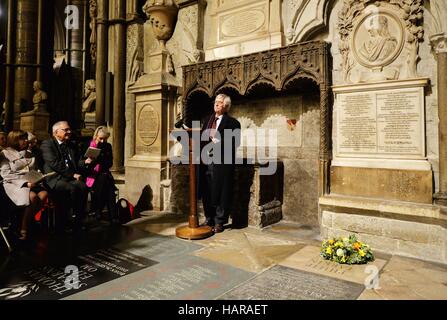 Sir Tom Courtney reads a poem close to the memorial stone to poet Philip Larkin after it was unveiled in Poet's Corner in Westminster Abbey, central London. PRESS ASSOCIATION Photo Picture date: Friday December 2 2016. Photo credit should read: John Stillwell/PA W Stock Photo