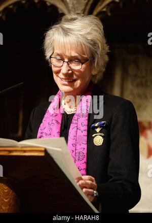 Baroness Bottomley reads a poem close to the memorial stone to poet Philip Larkin after it was unveiled in Poet's Corner in Westminster Abbey, central London. PRESS ASSOCIATION Photo Picture date: Friday December 2 2016. Photo credit should read: John Stillwell/PA W Stock Photo