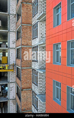 Side of of a house construction high-rise multilevel building with right angles closeup Stock Photo