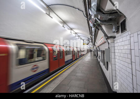London train arrive in empty subway station underground Stock Photo