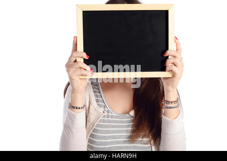 Portrait of a young beautiful woman holding chalkboard. Stock Photo