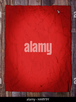 Blank page of old red vintage paper on wooden background Stock Photo