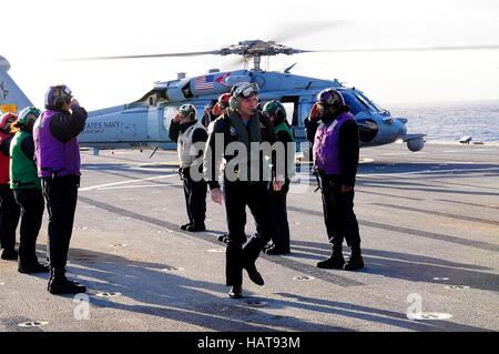 Australian Prime Minister Tony Abbott arrives on board the USN Blue Ridge-class command ship USS Blue Ridge for a tour during exercise Talisman Saber July 3, 2015 in Sydney, Australia. Stock Photo