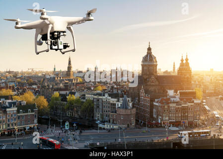 Drone with high resolution digital camera flying over Amsterdam historical city at Amsterdam, Netherlands. Stock Photo