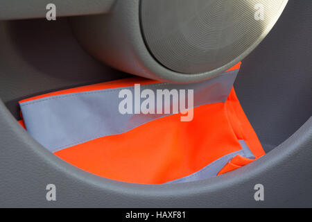 reflective vest in car door Stock Photo