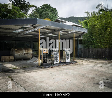 An old garage with disused petrol pumps Stock Photo