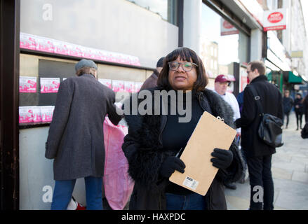 Shadow home secretary Diane Abbott, MP for Hackney North and Stoke Newington, visits members of the Communication Workers Union on the picket line outside a closed Post Office in Hackney, east London, as members of the CWU and Unite are staging a 24-hour strike in disputes over pensions, jobs and closures. Stock Photo