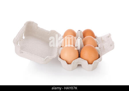 Half dozen  brown chicken eggs in box  isolated on white background Stock Photo