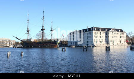 Replica VOC-ship Amsterdam moored next to the Dutch National Maritime Museum (Scheepvaartmuseum) in Amsterdam, The Netherlands Stock Photo