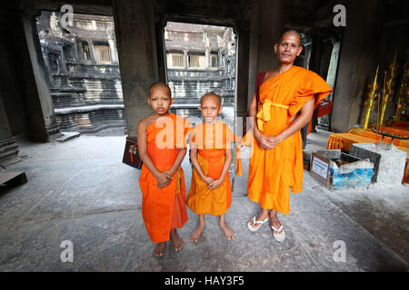Young Buddhist monks at Angkor Wat Temple in Siem Reap, Cambodia Stock Photo