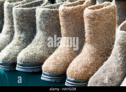 Warm shoes made of felt (felt boots) Stock Photo