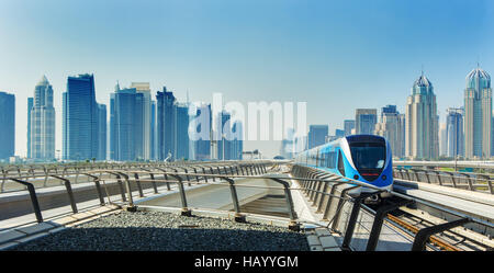 Metro railway and fully automated train in modern and luxury Dubai city,United Arab Emirates Stock Photo
