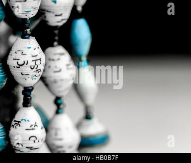 Necklaces made from paper beads. Stock Photo