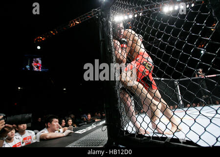 UFC fighter Dong Hyun Kim, right, fights Amir Sadollah at UFC 114 on May 29, 2010 in Las Vegas, Nevada. Photo by Francis Specker Stock Photo