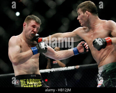 UFC fighter Michael Bisping, right, fights Dan Miller at UFC 114 on May 29, 2010 in Las Vegas, Nevada. Francis Specker Stock Photo